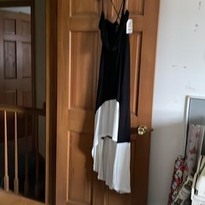 Long dress with handkerchief hem. New with tags. Size small